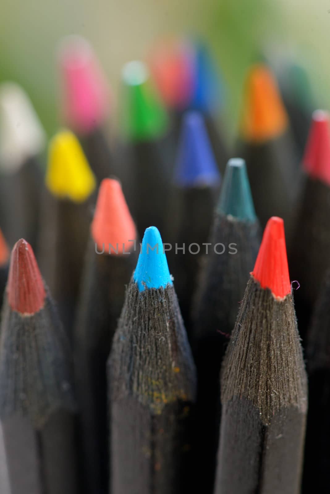 Colored  black pencils in jar