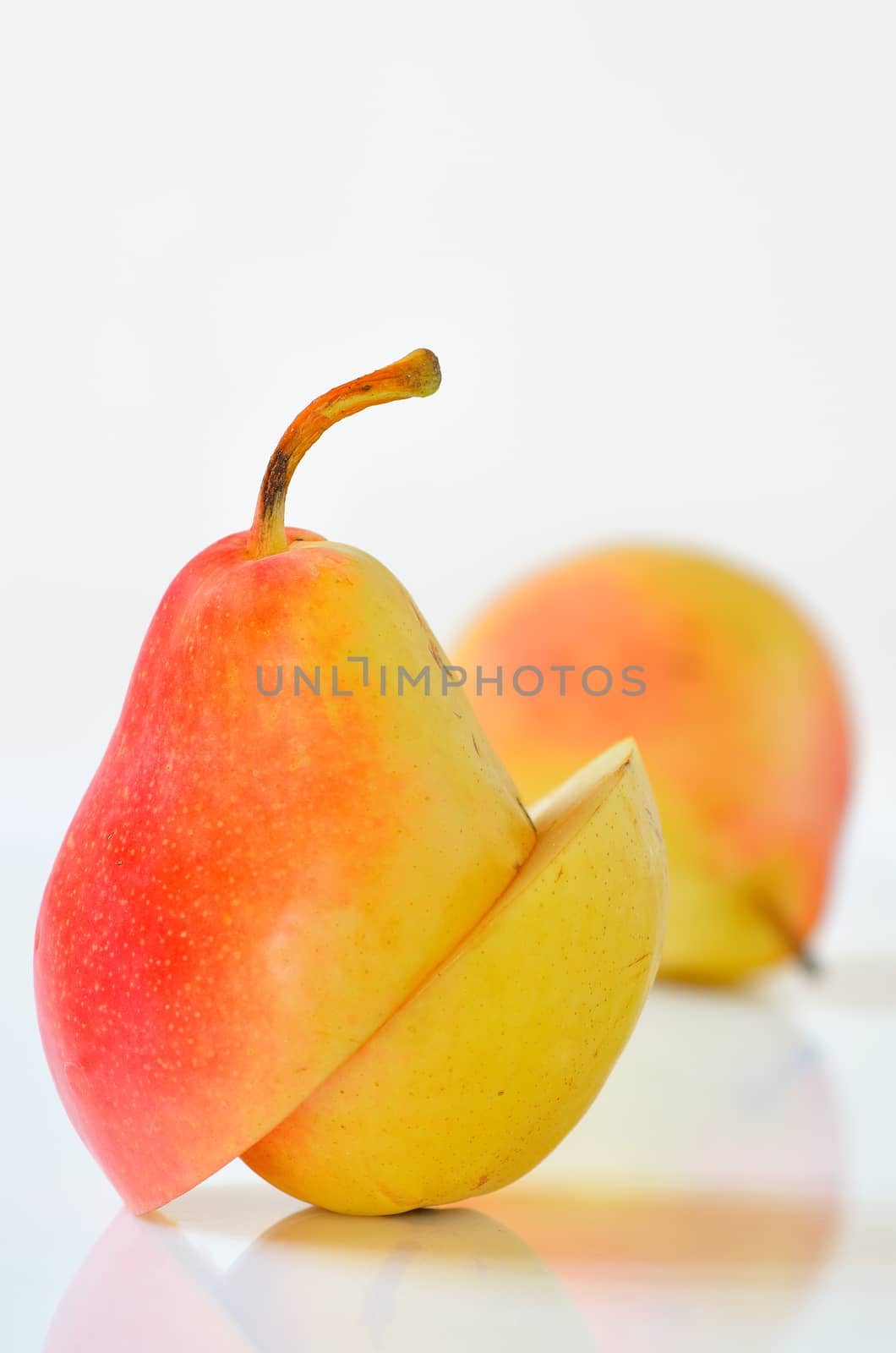 Sliced Ripe Pear Isolated  by jordachelr