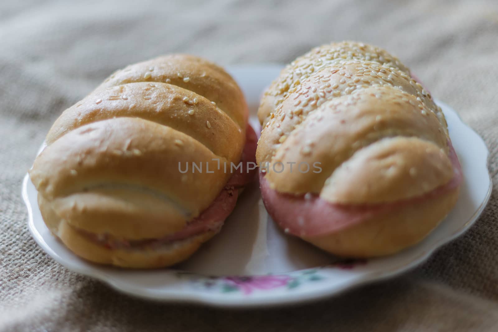 buns on the plate on a light blurred background