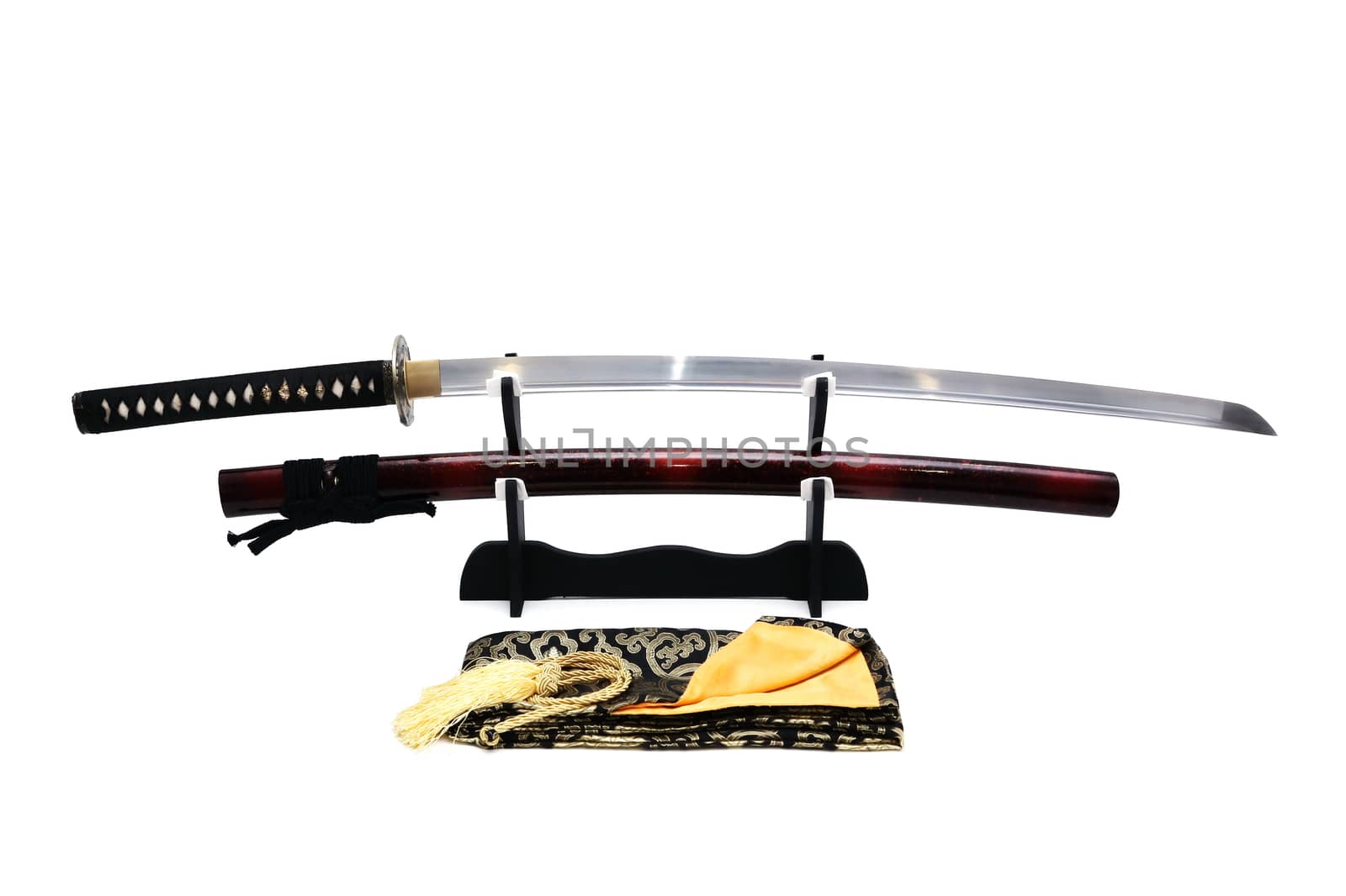 Japanese sword on stand with white background