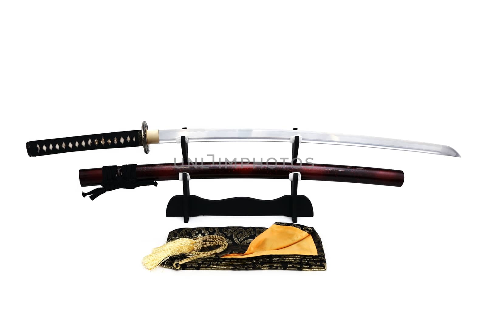 Japanese sword on stand with white background