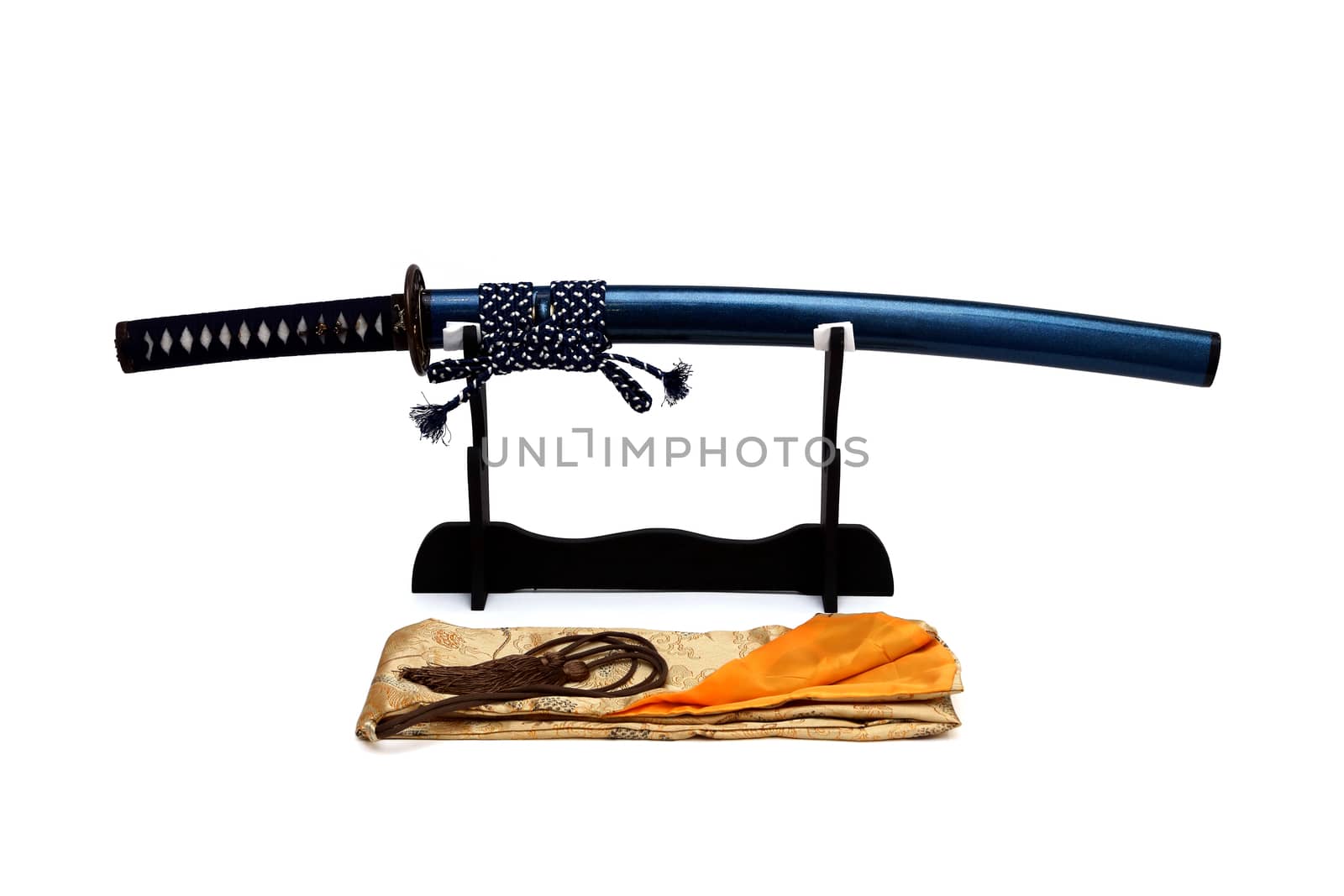 Japanese sword on stand with white background