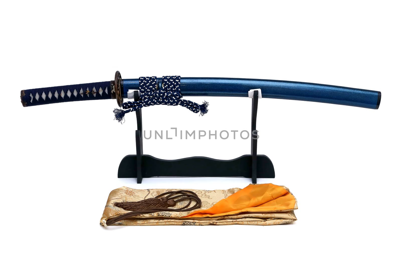 Japanese sword on stand with white background