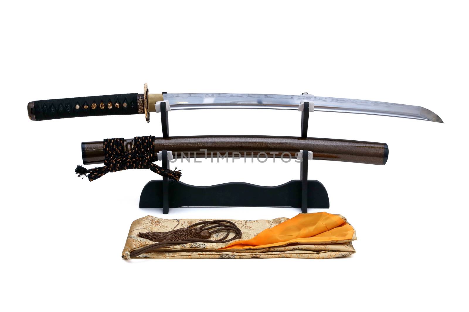 Japanese sword on stand with white background