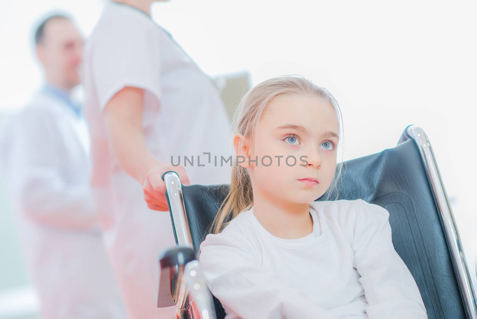 Caucasian Girl on the Wheelchair in the Hospital.