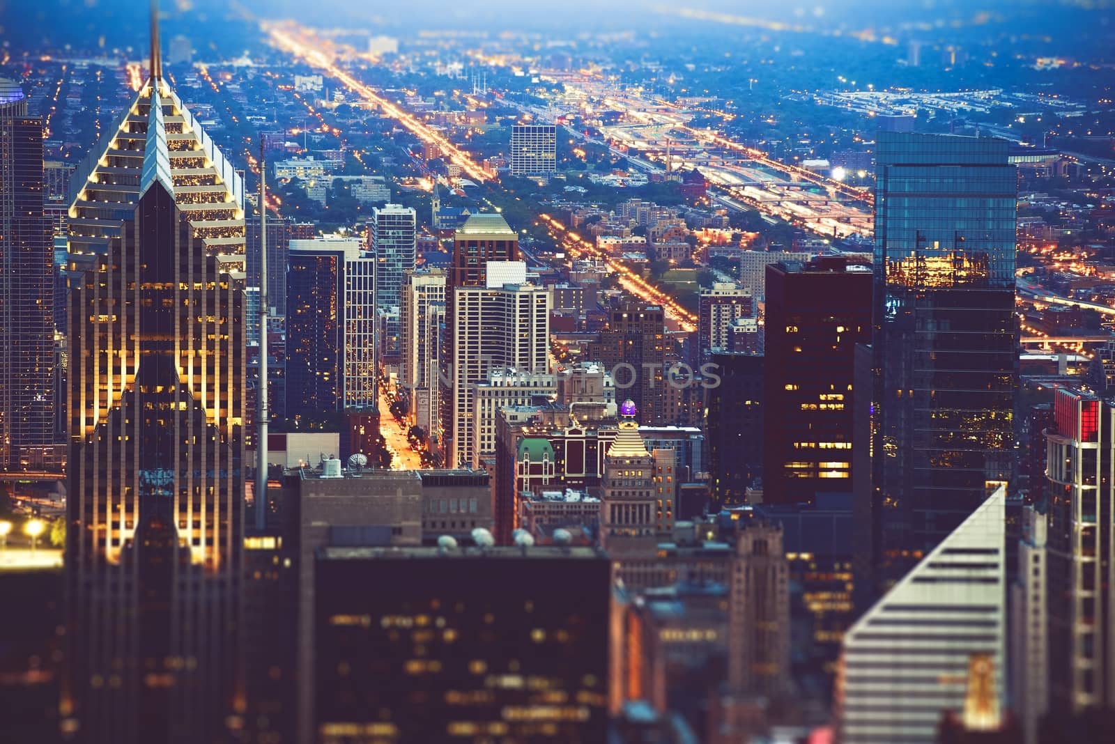Colorful Chicago Night. Downtown Chicago Skyscrapers and Iluminated Cityscape.