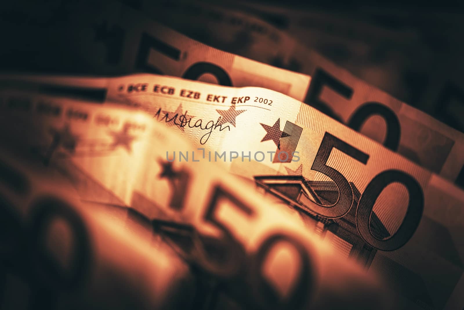 Conceptual Euro Money Photo in Dark Sepia Like Color Grading. Euro Banknotes Closeup.