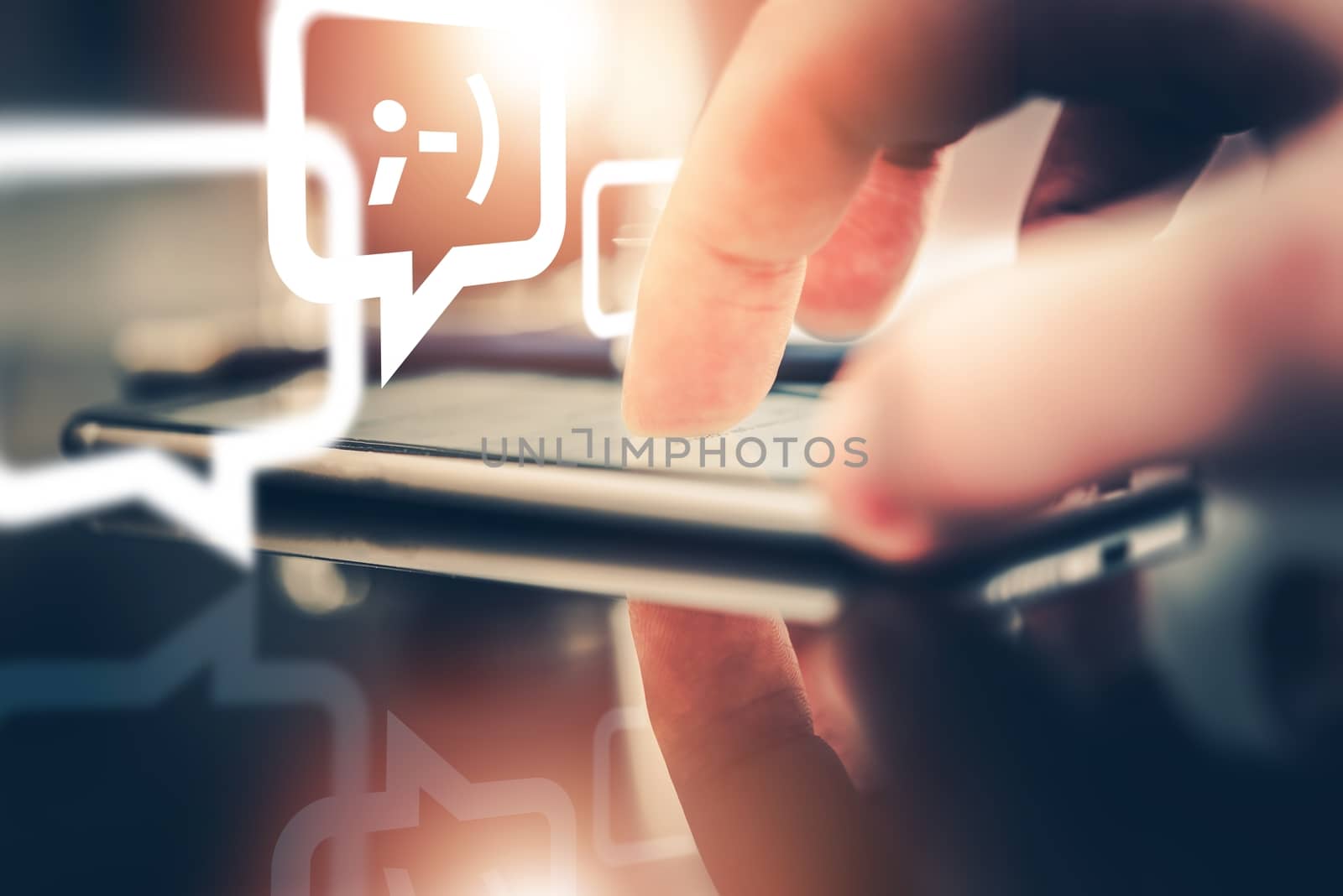 Mobile Messaging and Chatting Concept Photo. Smartphone, Touching Finger and the Chatting Icons.