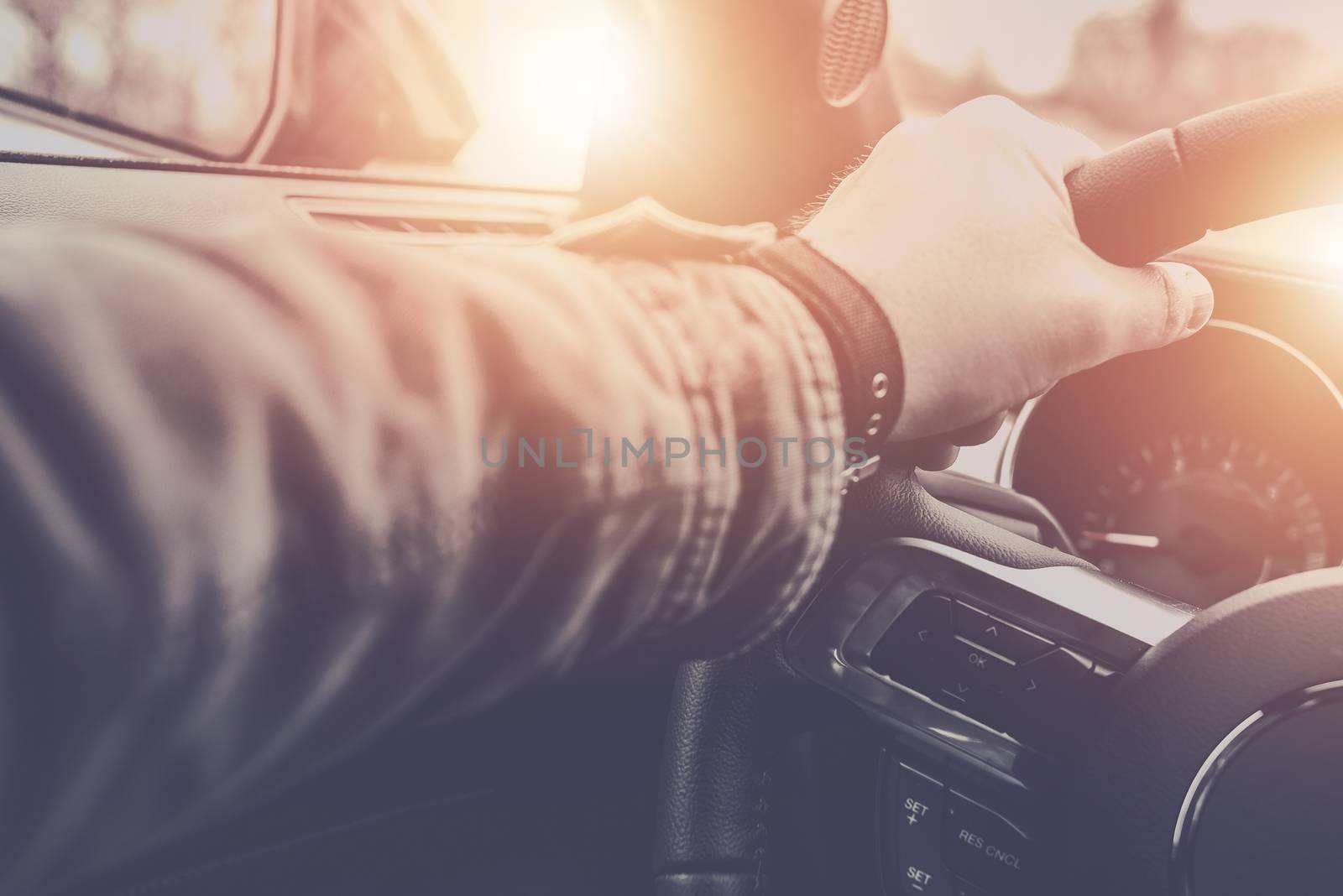 Relaxed Driver in His Modern Car on the Road To His Destination. Driving and Transport Concept.