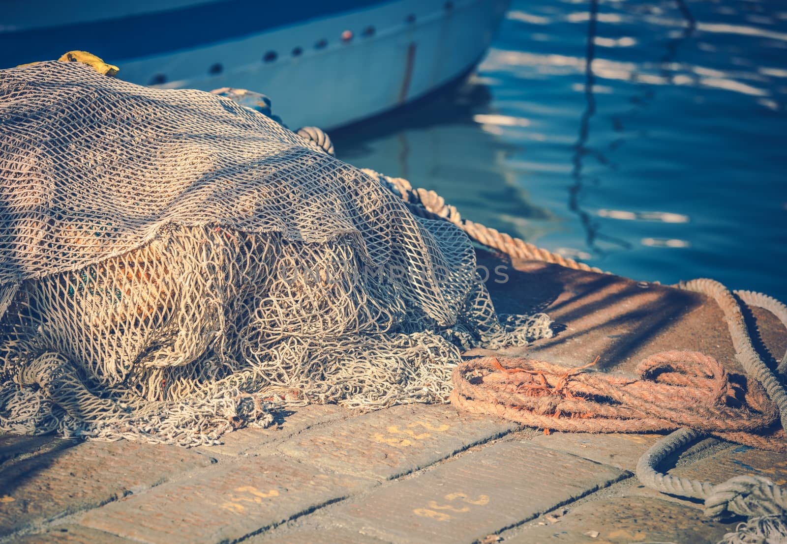 Fishing Nets in the Marina Closeup Photo. Fishing Industry.