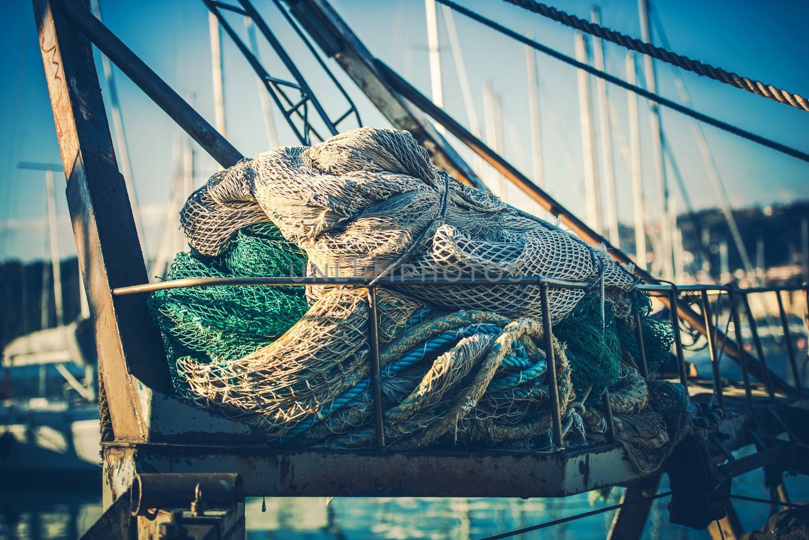 Fisherman Fishing Nets in the Marina. Fishing Industry.
