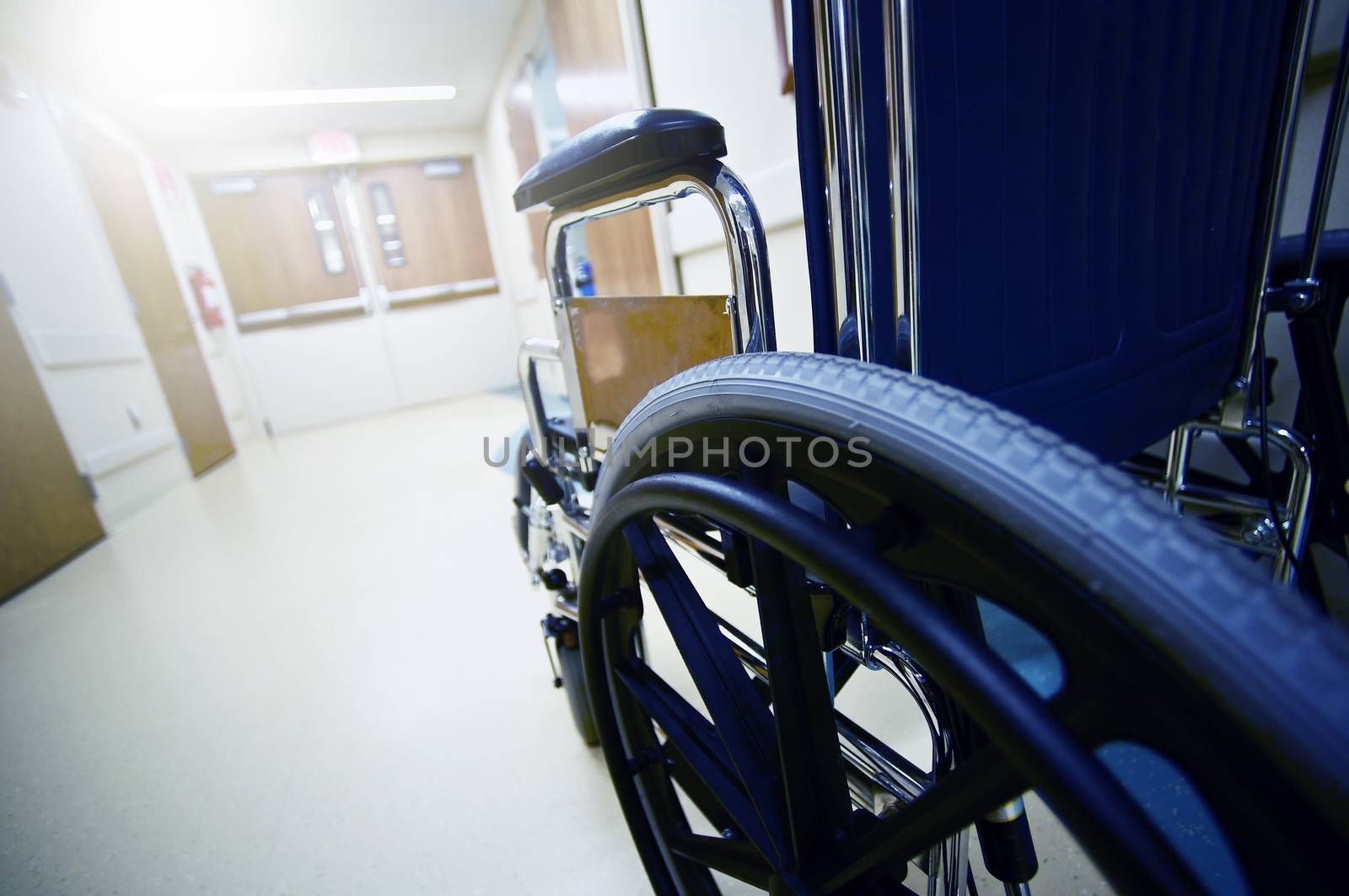 Hospital Hallway Wheelchair. Hospitals, Disability and the Healthcare Concept Photo.