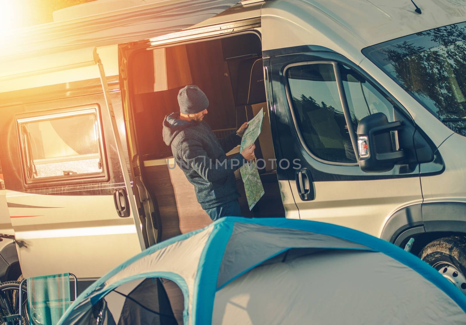 Men Camping in Motorhome by welcomia