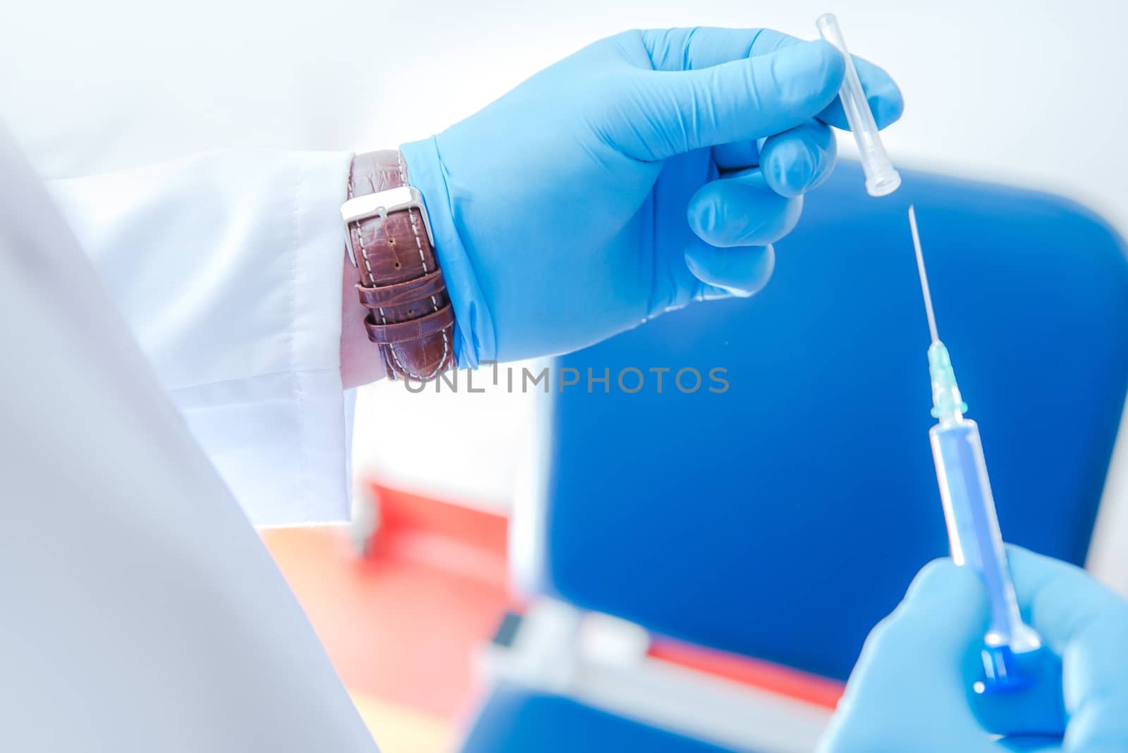 Preparing Syringe For Vaccination in the Doctor Office. 