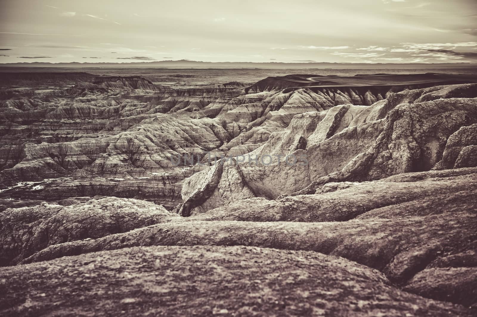 South Dakota Badlands Raw Dramatic Landscape. Badlands in Western State of South Dakota, United States of America. Dramatic Duotone Sepia Color Grading.