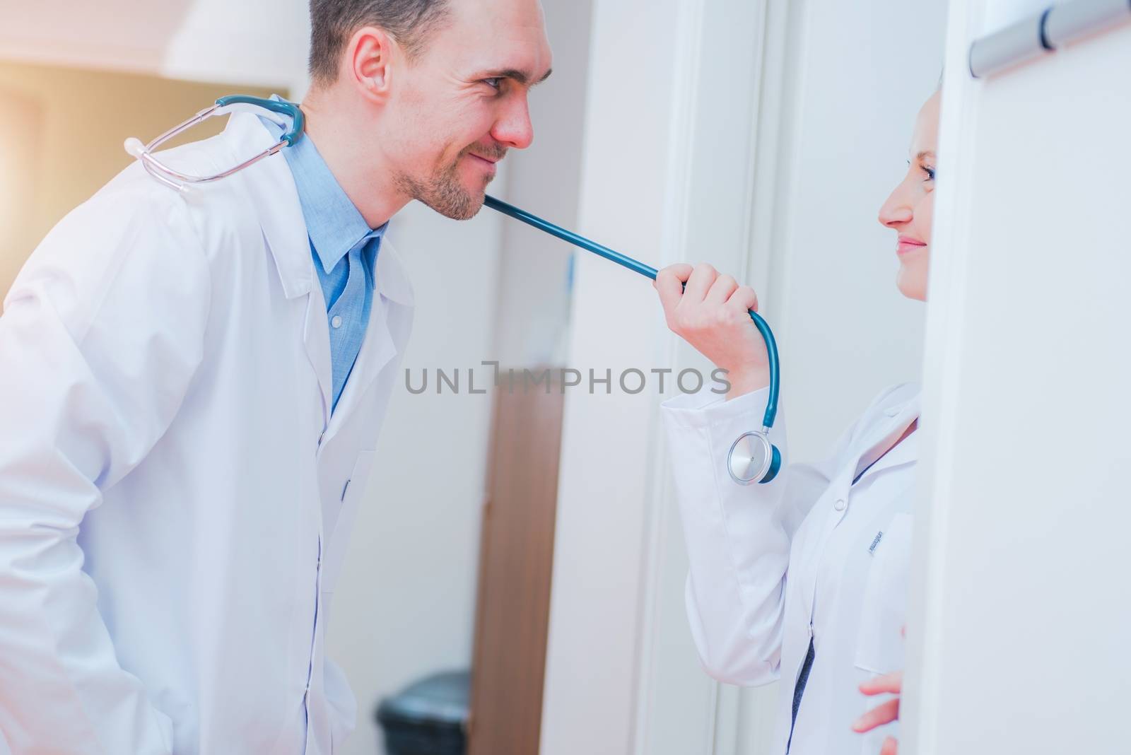 Workplace Romance Concept. Two Doctors Having Romance in the Hospital. 