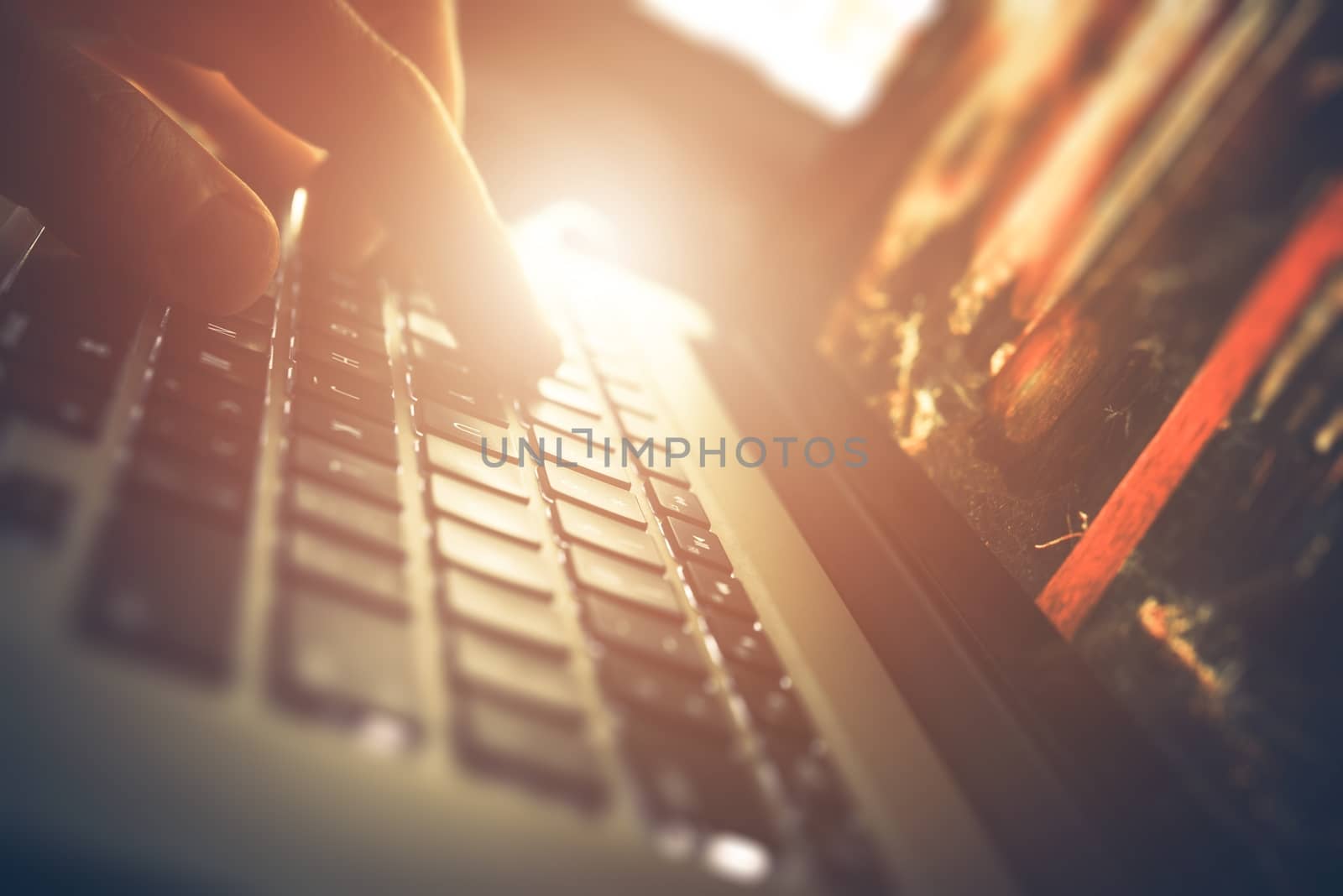 Computer Works Closeup. Hand on the Laptop Computer.