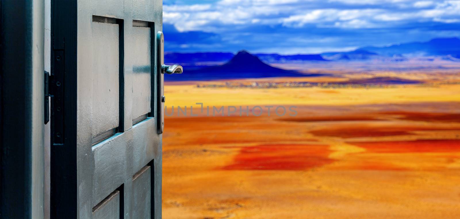 Opened door concept to colorful desert landscape