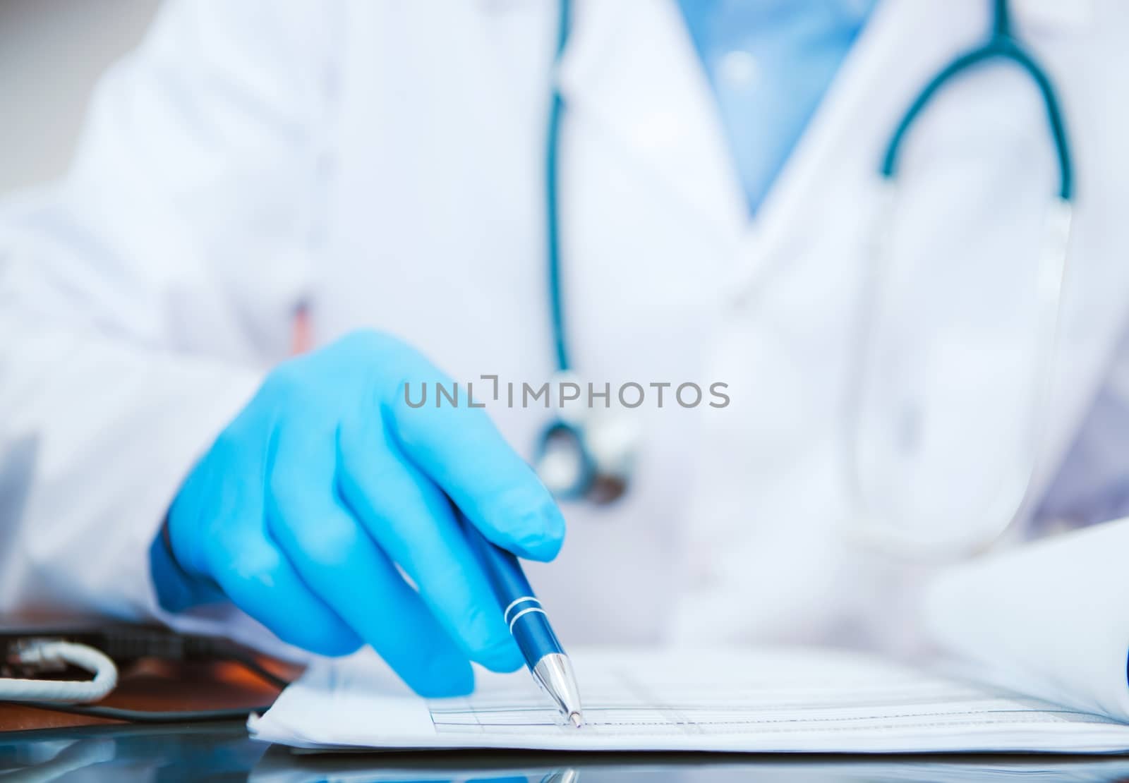 Doctor Documentation Check. Medical Doctor Working in His Hospital Room Checking Important Sickness History Documents Looking For Cure Solution. Doctor Looking For Cure Solution