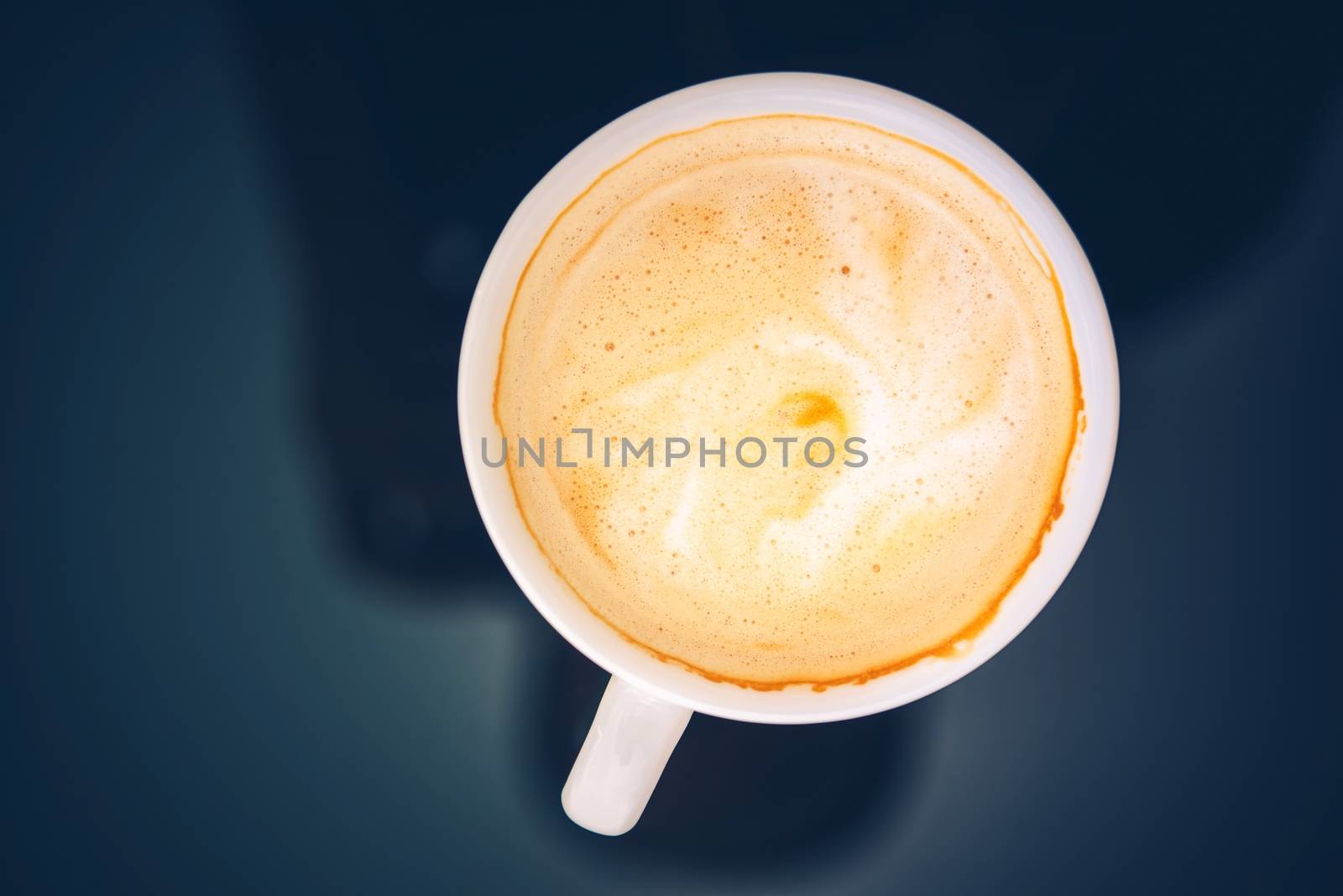 Clean Coffee Cup Top View. Cup of the Coffee on Glassy Table