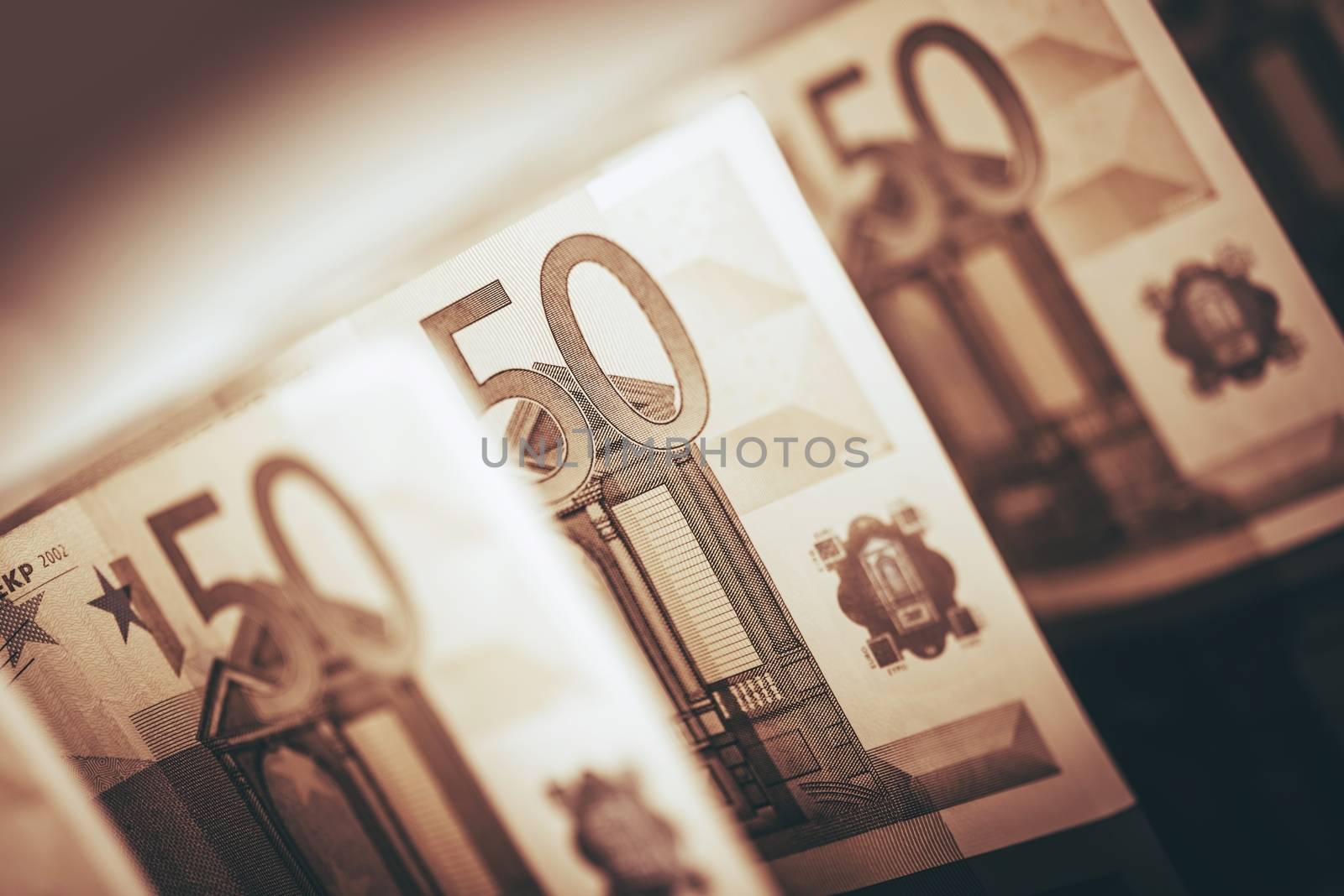Euro Business Concept. Euro Banknotes Row Closeup Photo. Sepia Color Grading.