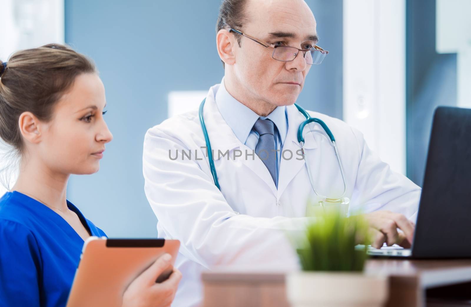 Medical Doctor with Laptop by welcomia