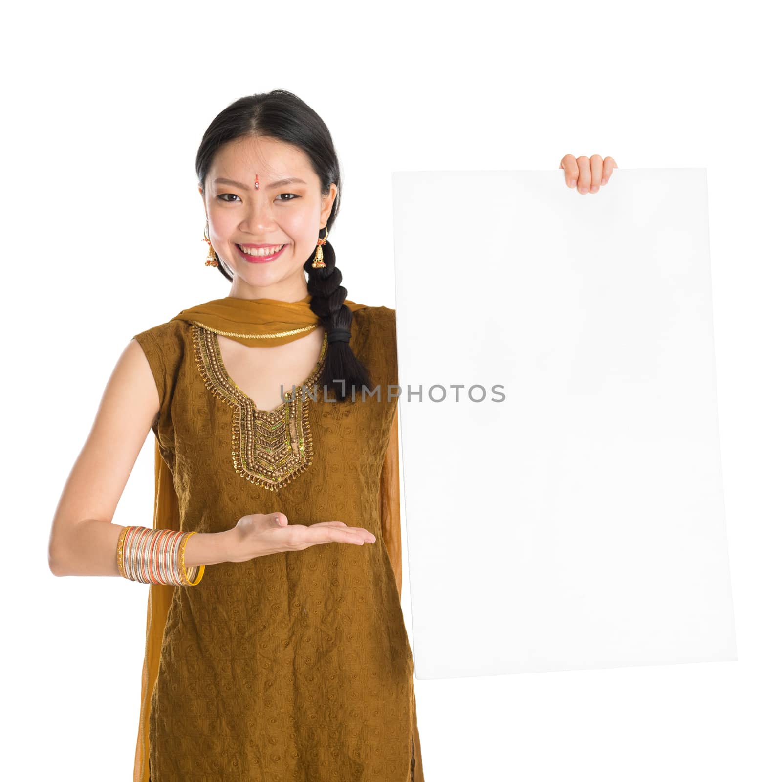 Punjabi female holding blank white paper card. by szefei