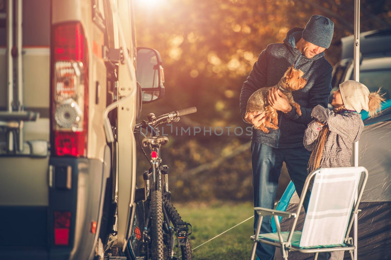 Family with Dog on Camping by welcomia