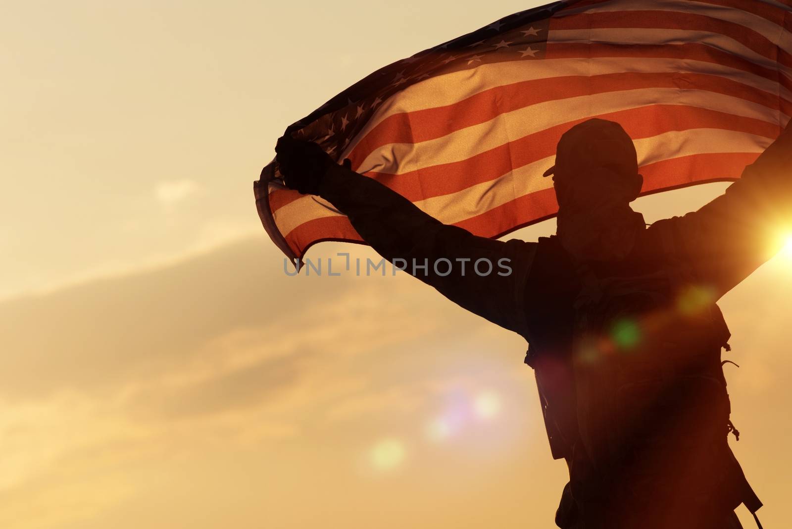 American Flag Celebration. Navy Soldier with United States of America Flag in Hands. Military Concept.