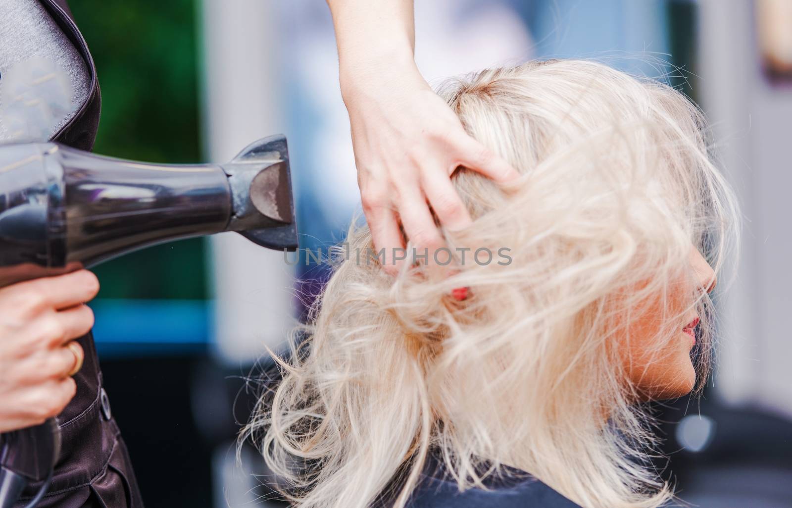 Hairdresser Business. Beauty Studio Hairstylist Air Blowing Clients Hair. 