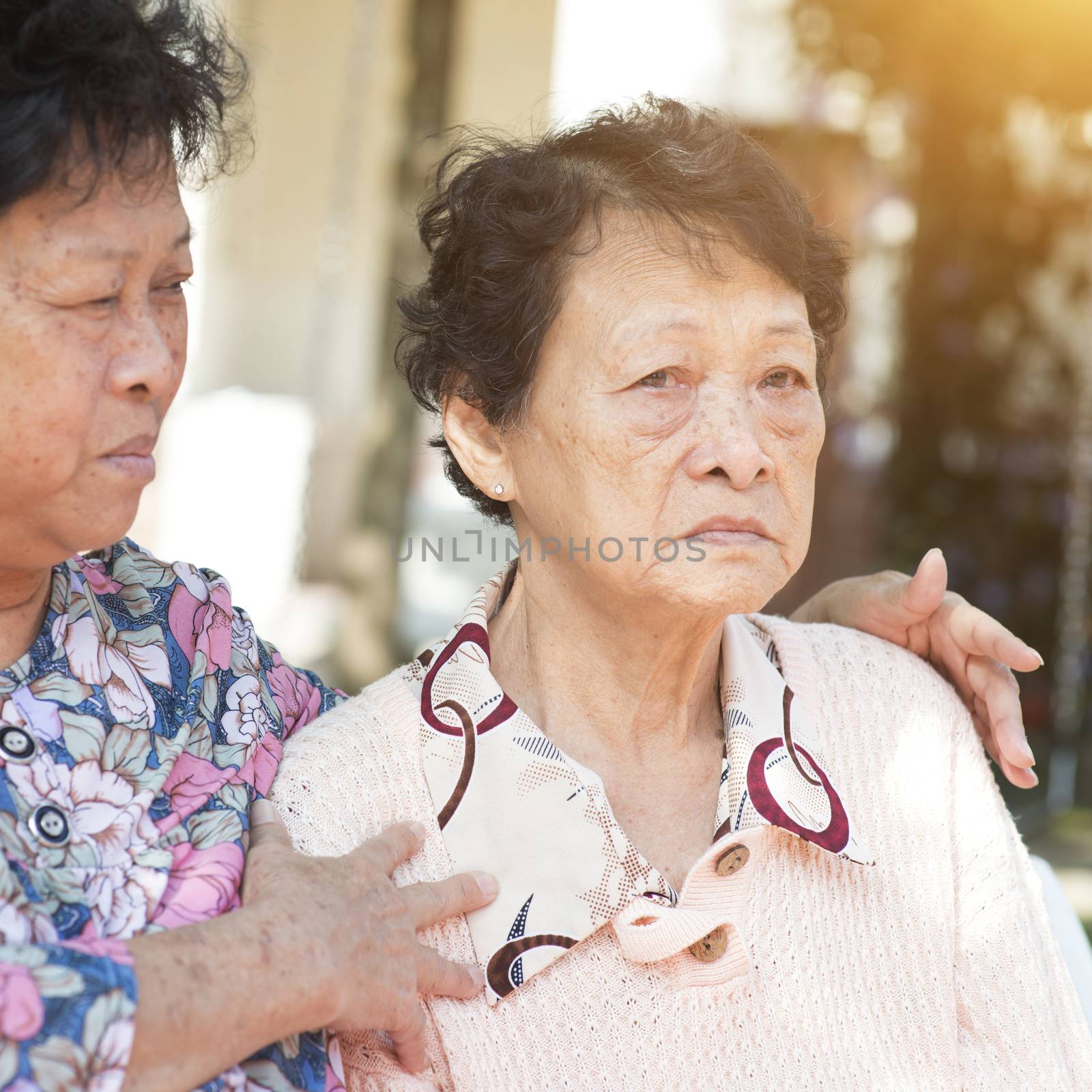 Asian elderly women chatting outdoor by szefei