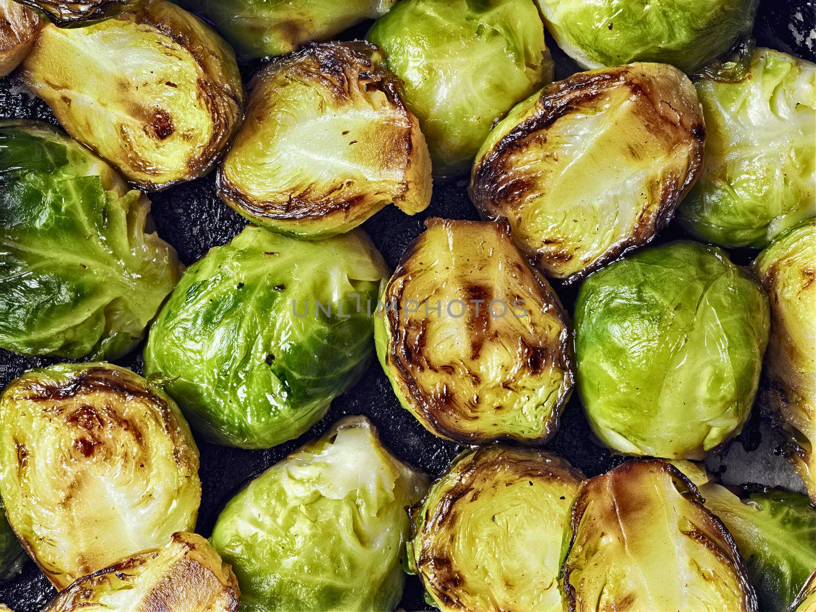 rustic crispy fried brussels sprouts food background by zkruger