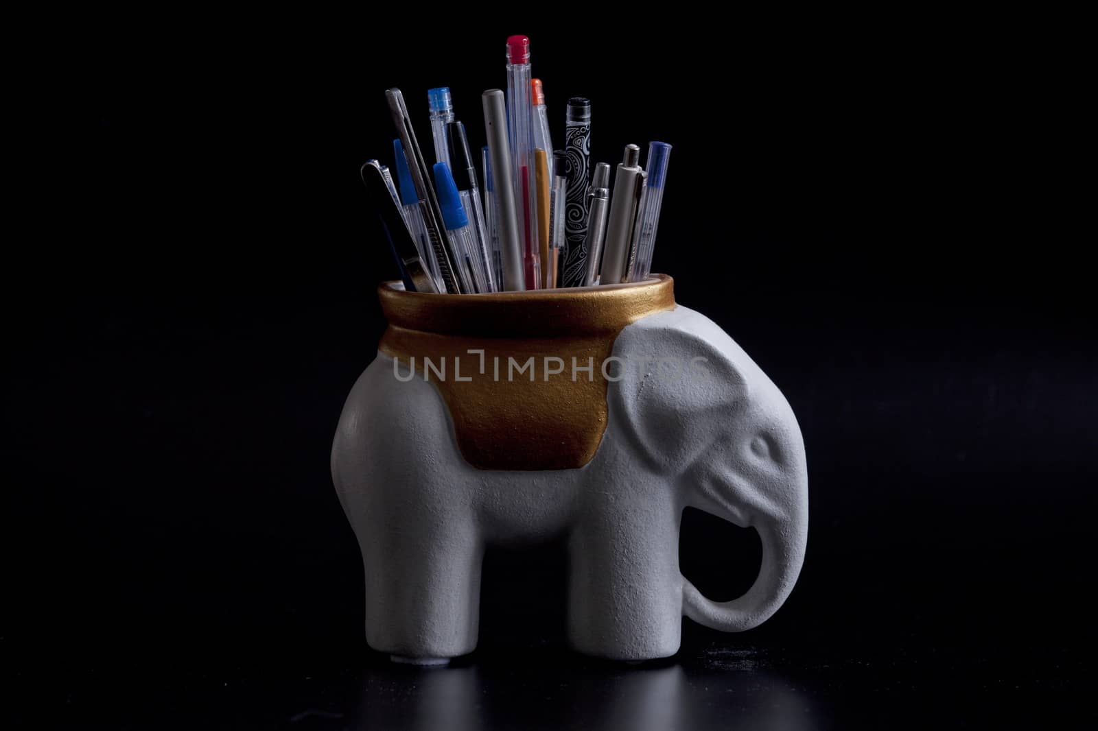 Elephant holder pencils and pens still life by mrivserg