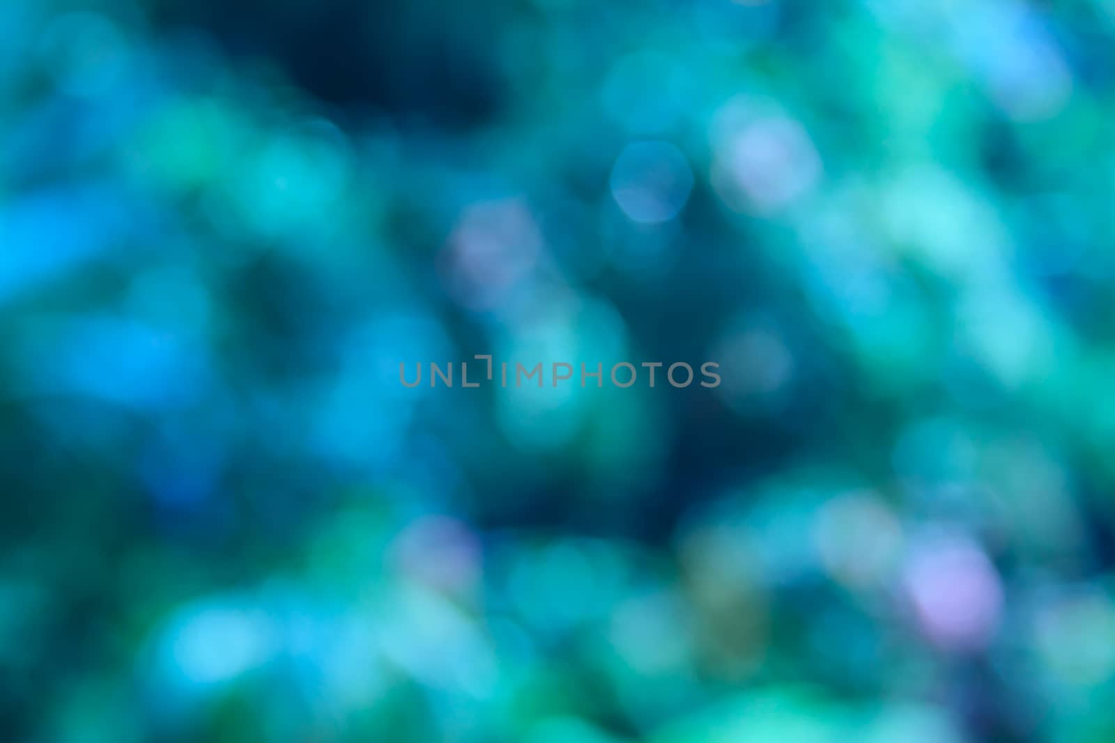 Blue and green bokeh background, abstract colorful defocused circular by worrayuth