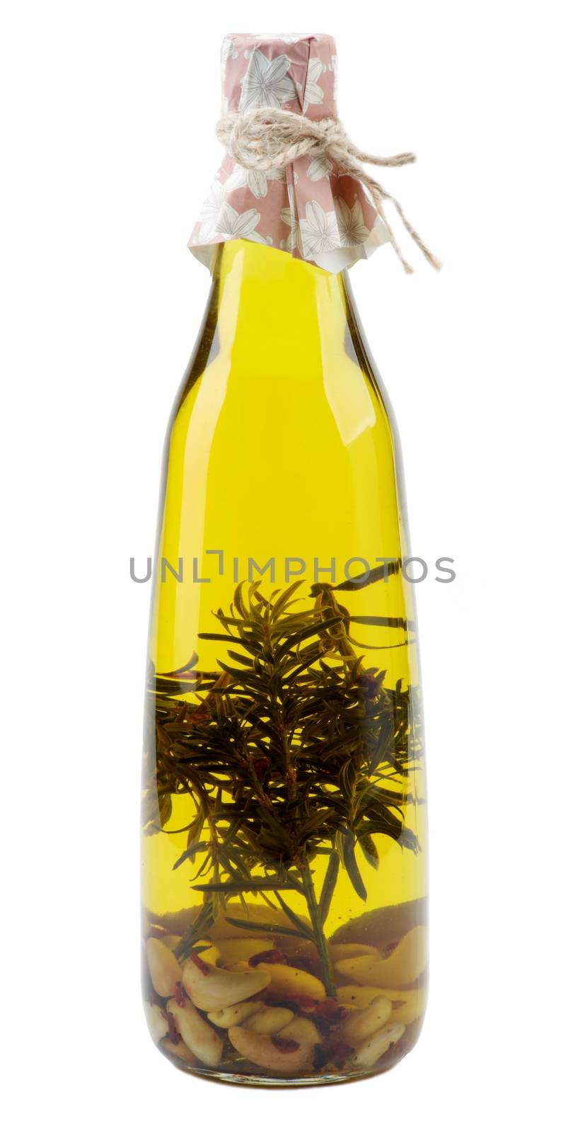 Bottle of Handmade Olive Oil with Rosemary, Spices and Garlic isolated on White background