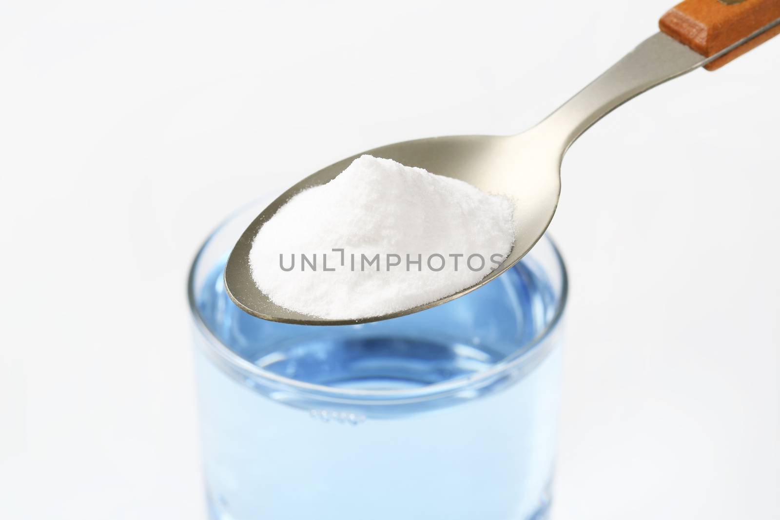 spoon of baking soda by Digifoodstock