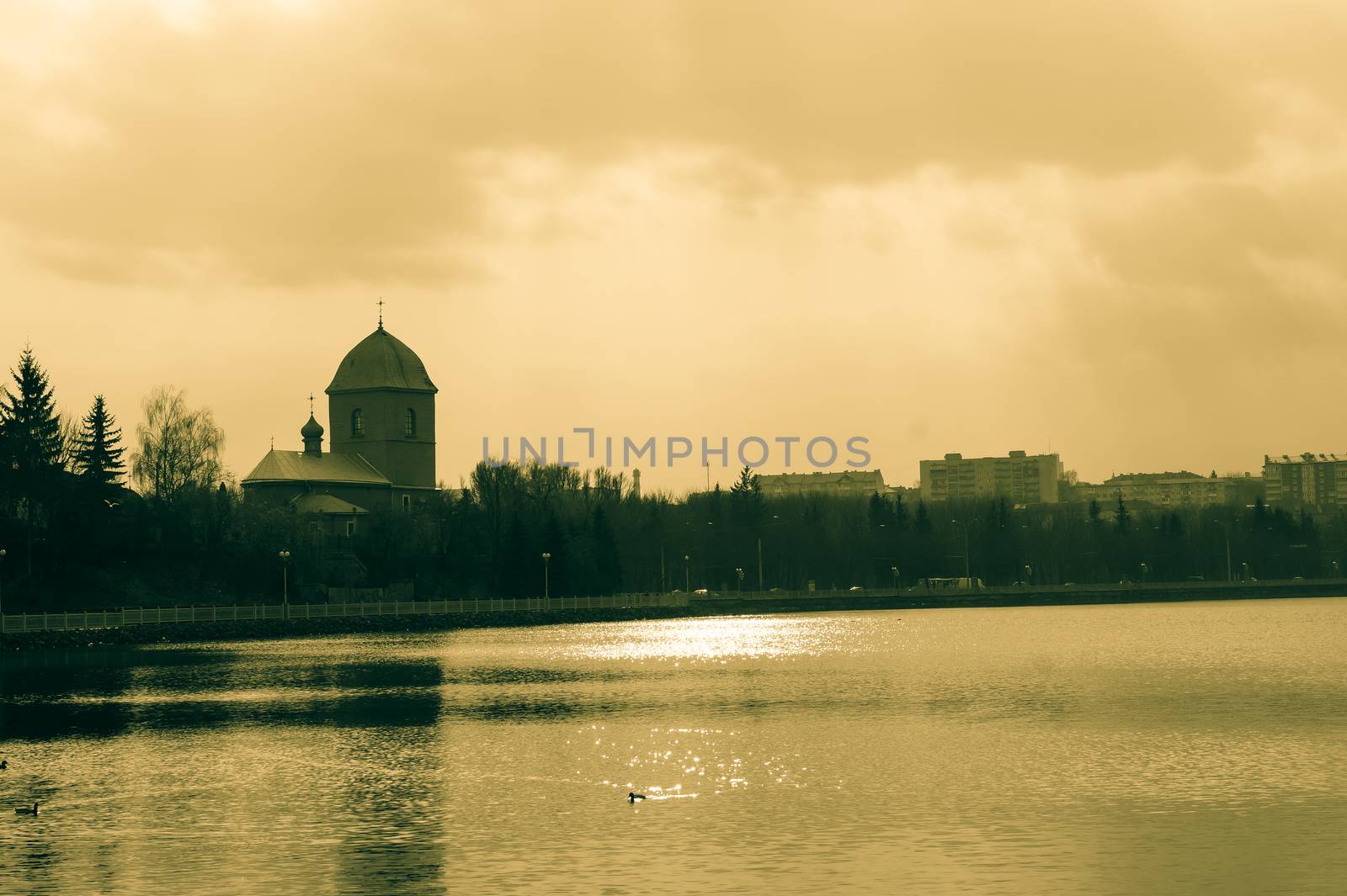 the old Church by the lake city skyline retro photo