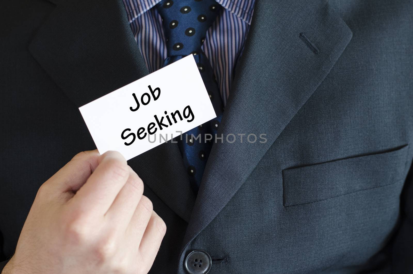 Job seeking text note concept over business man background