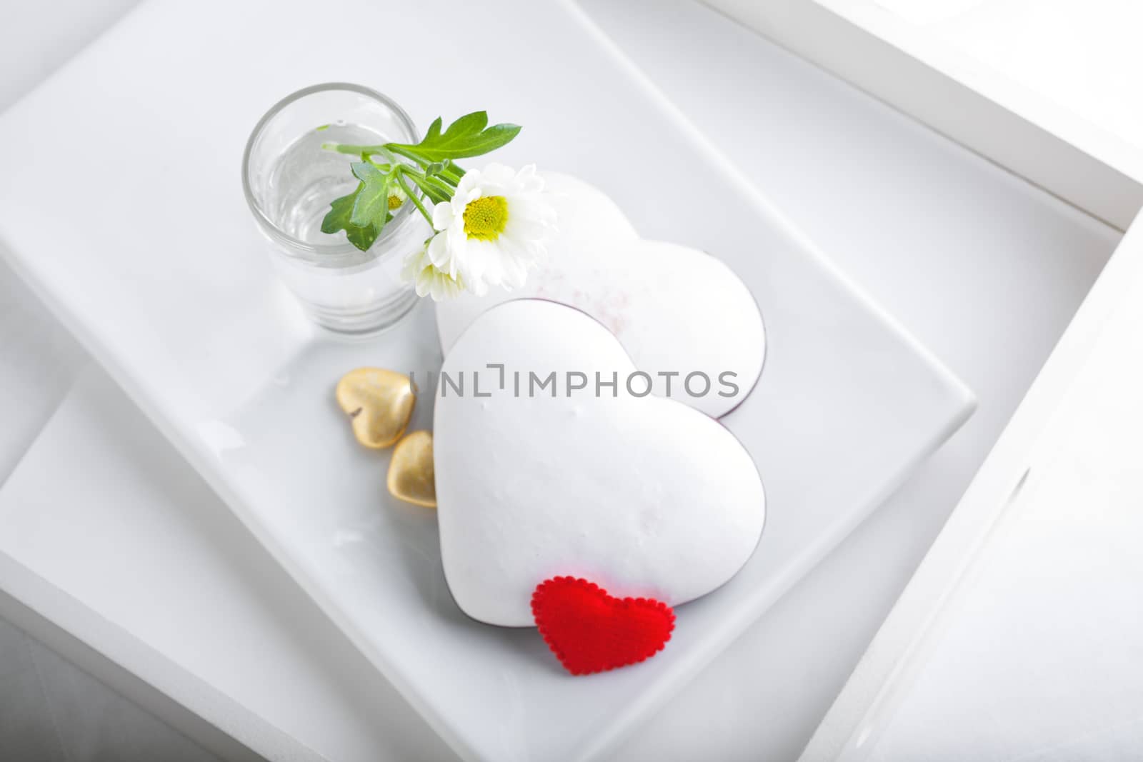 Colorful Valentine Cookies served on a white plate.