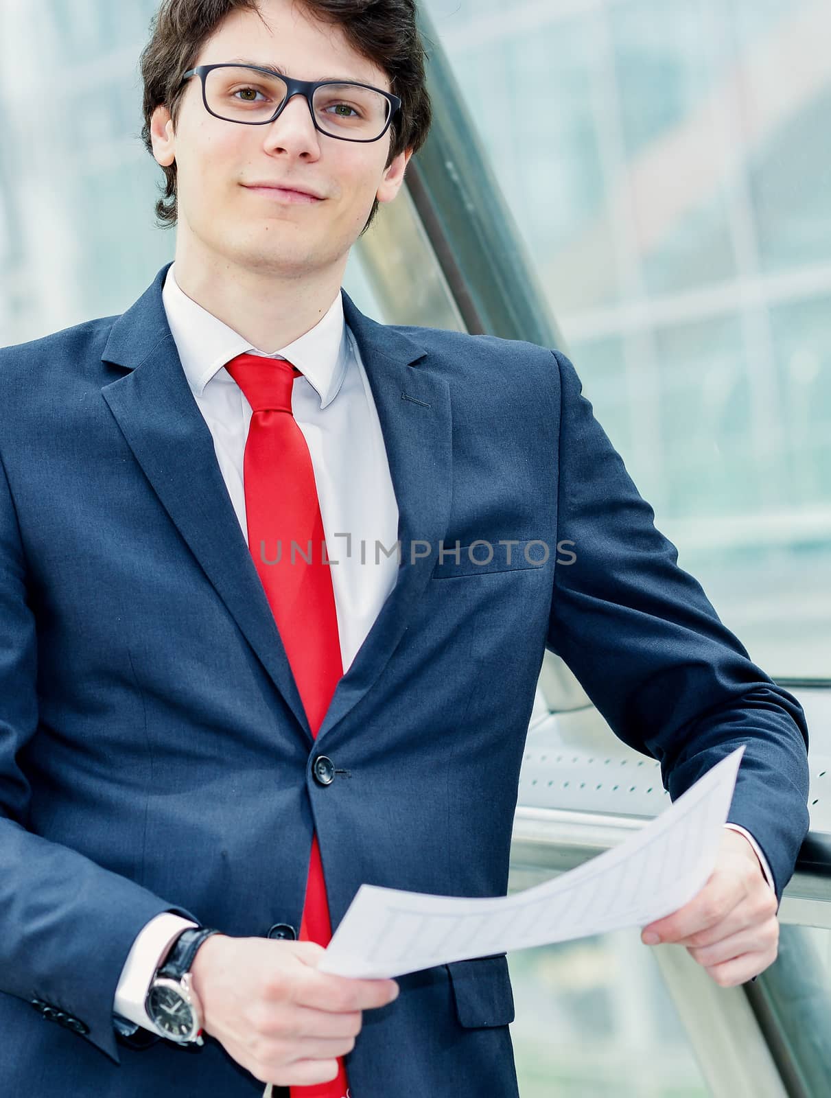 Business junior executive walking outside office