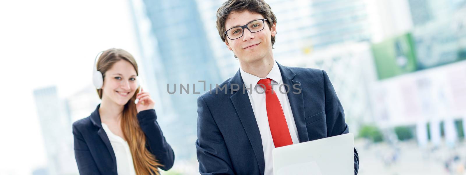 Business junior people with operator on background by pixinoo