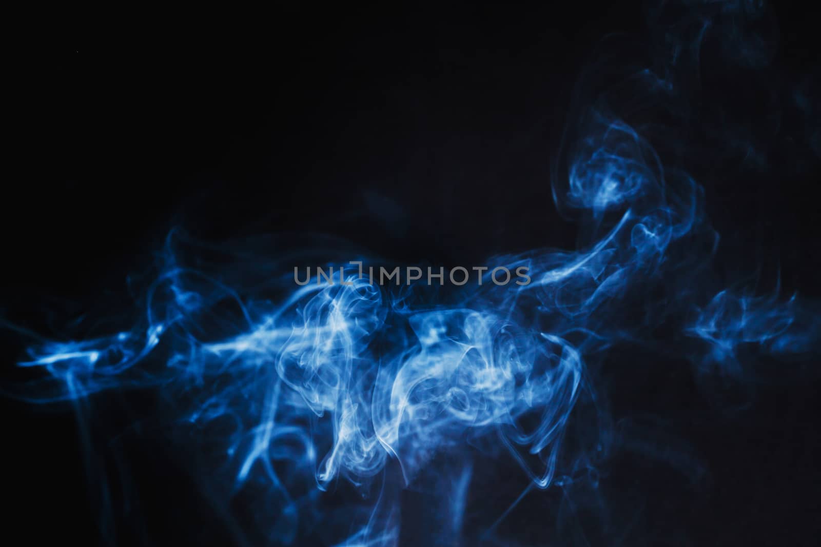Abstract Blue Smoke on black background by nopparats
