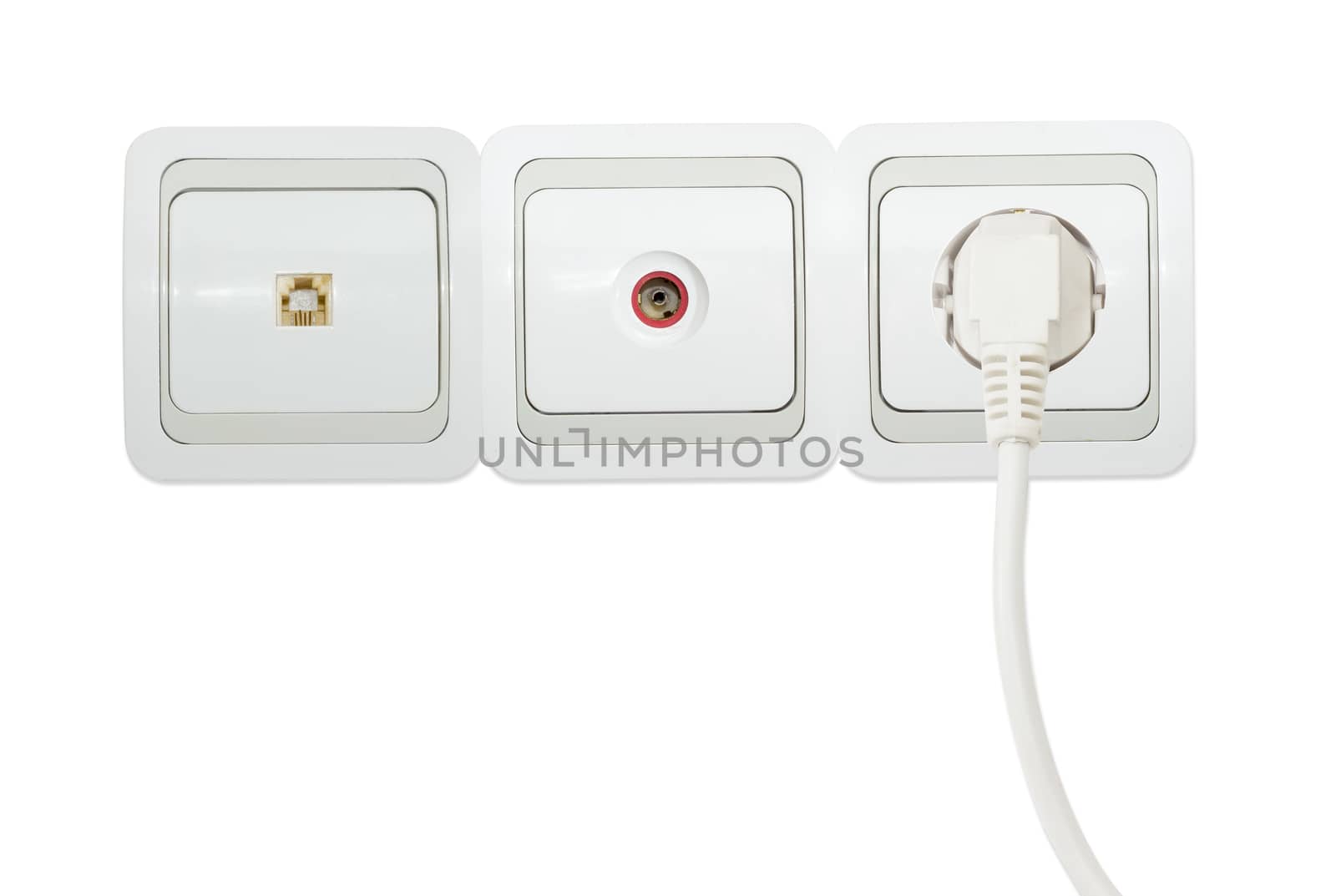 Block of three various white and gray domestic wall sockets including power socket with the connected white power cable, telephone socket and TV aerial coaxial socket on a light background
