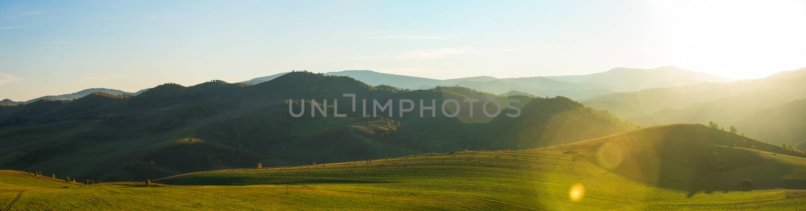 Beauty dawn in the mountains in Altay, panoramic picture