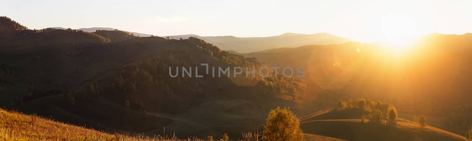 Beauty sunset in the mountains in Altay, panoramic picture