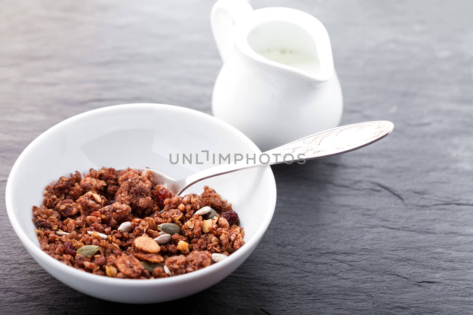 Healthy Chocolate Oat Bars Granola with milk on the table