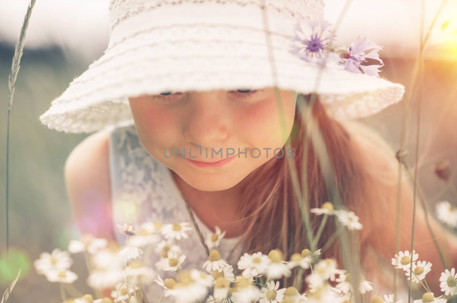 Caucasian Girl Exploring the Nature. Journey Into the Summer Meadow.