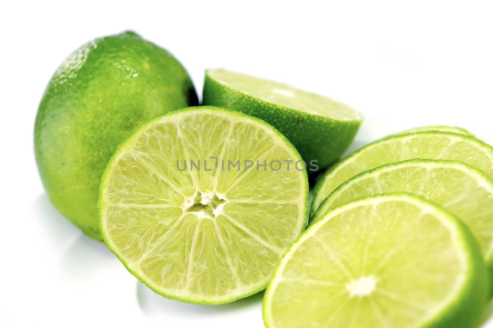 Organic Fresh Limes on White Background. Fruits Photo Collection.