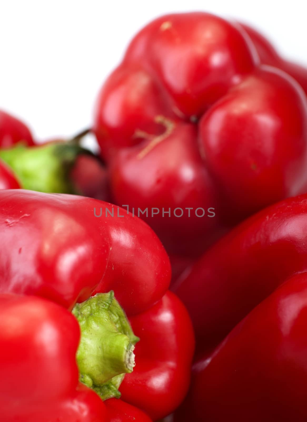 Fresh Red Paprika - Fresh Red Paprikas Isolated on White. Vertical Paprika Photo.