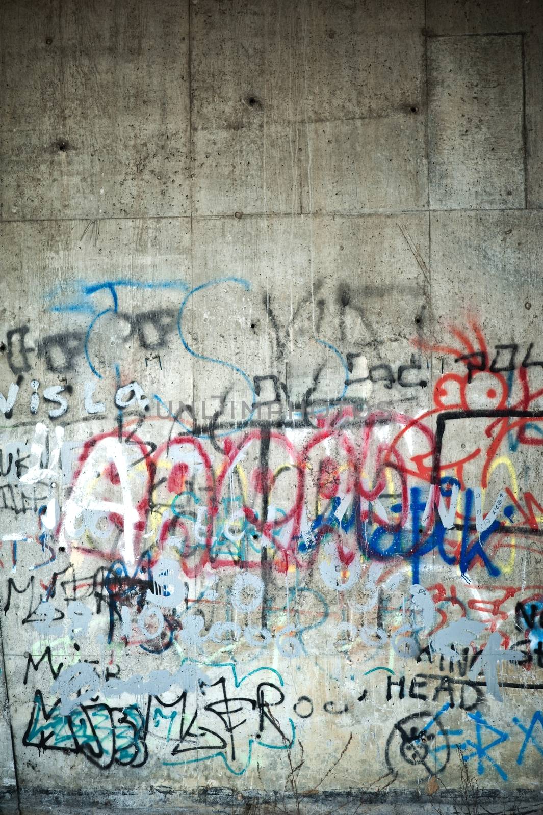 Graffiti Wall Background. Dirty Damaged by Graffiti Building Wall. Vertical Photo.